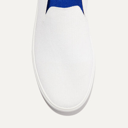 The slip-on Sneaker in Bright White shown from the top view with detailing of the front of the shoe.