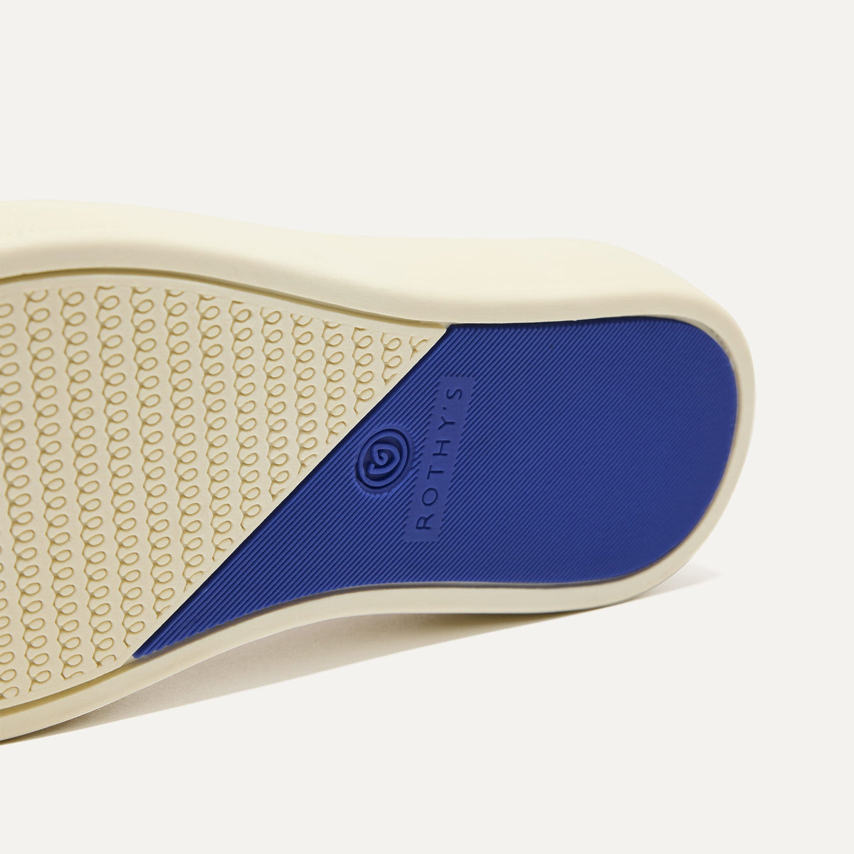 The sole of The Kids Sneaker in Sand.