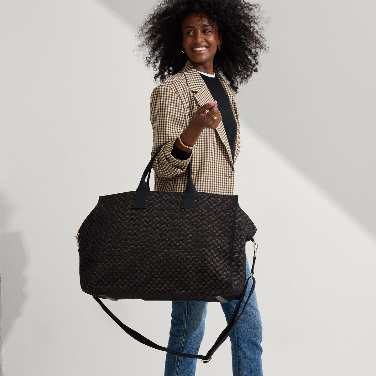 hover | The Weekender in Night Song shown on model.