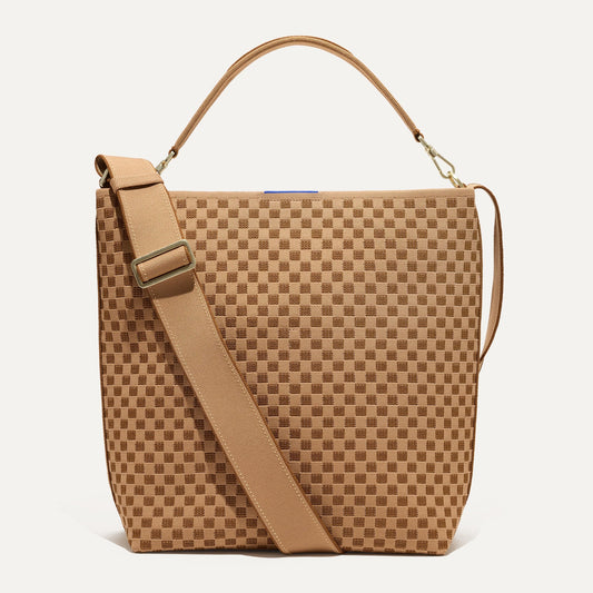 PDP |The Bucket Bag in Hazelnut shown from the front.