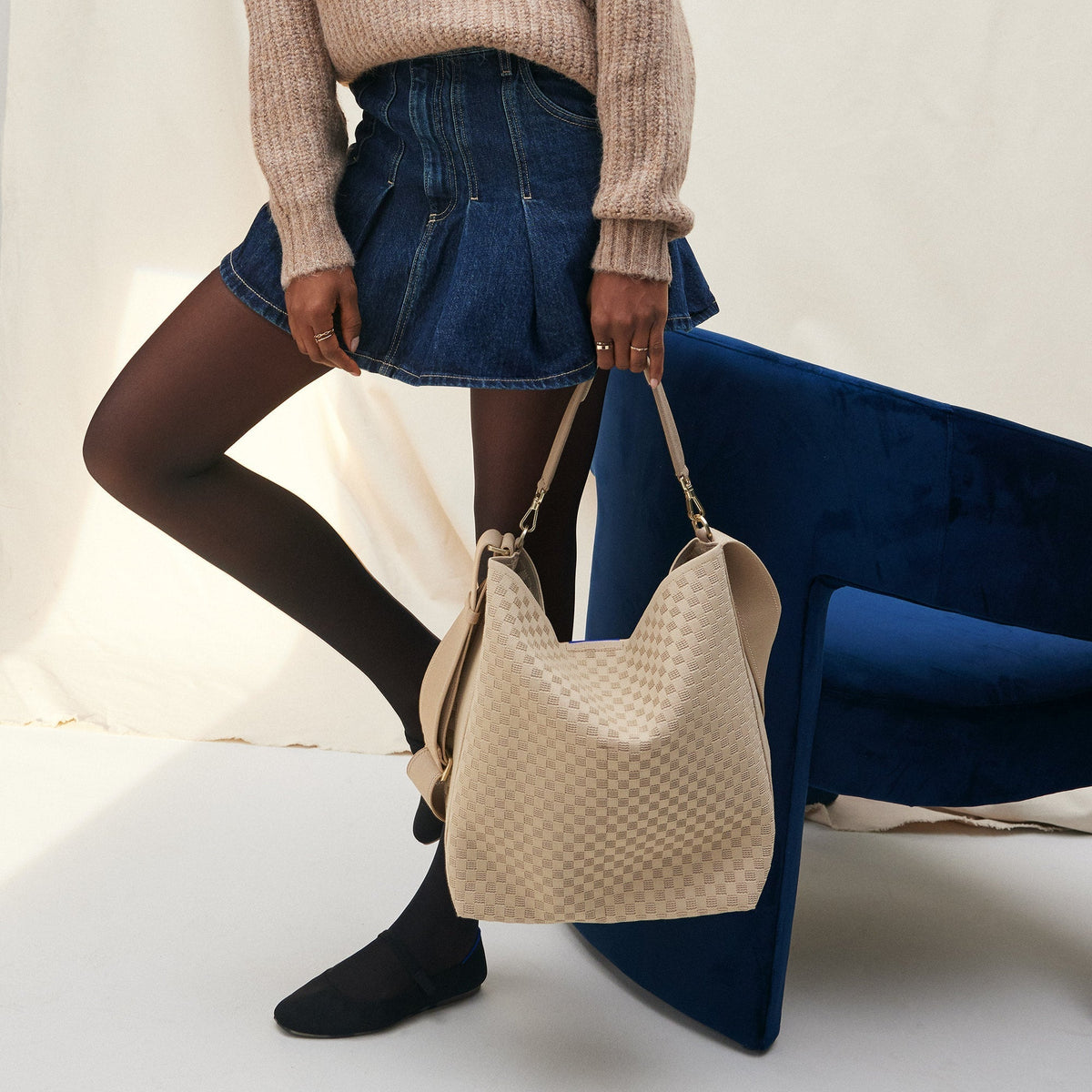 hover | The Bucket Bag in Knot Brown shown on model.