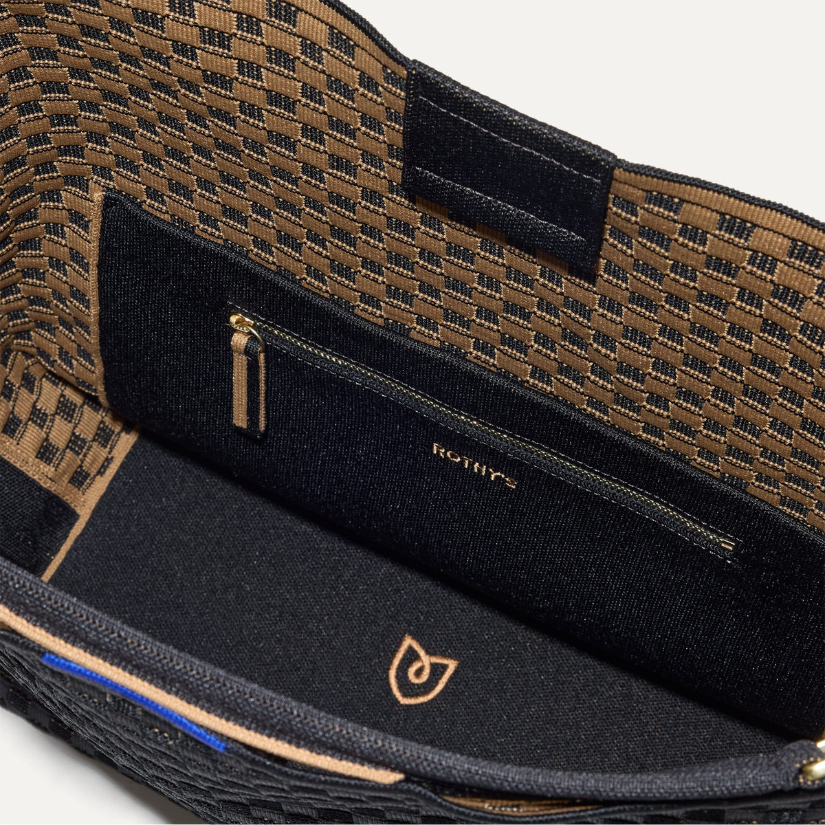 The Bucket Bag in Night Song close up of interior zipper pocket.