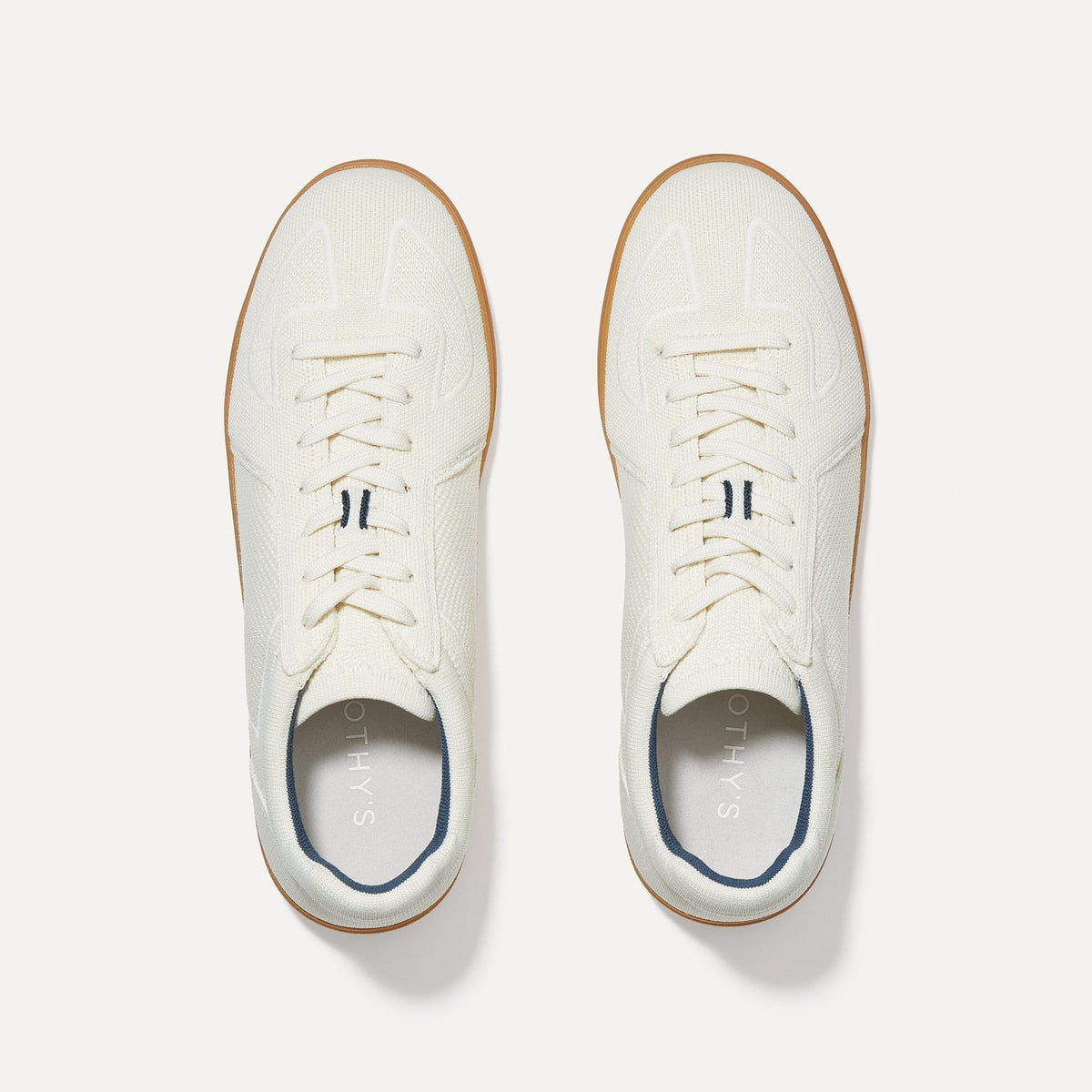 A pair of The RS01 Sneaker in Bone shown from the top.