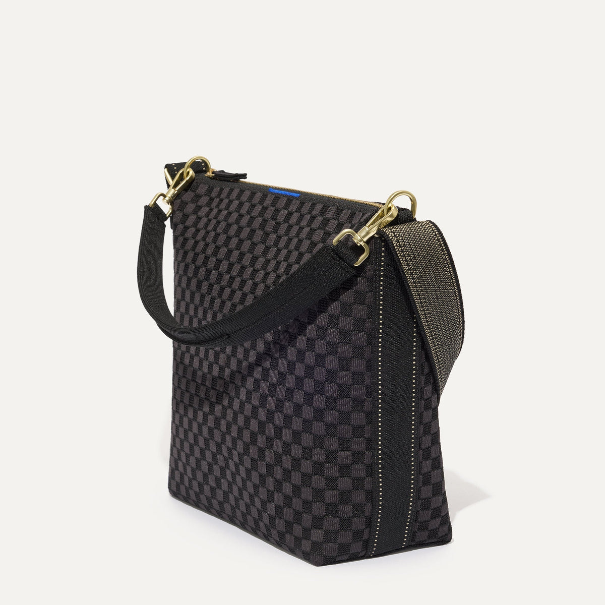 The Mini Zip Bucket in Black Sand shown at a diagonal view from the left.
