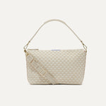 PLP |The Daily Crossbody Bag in White Sand shown from the front.