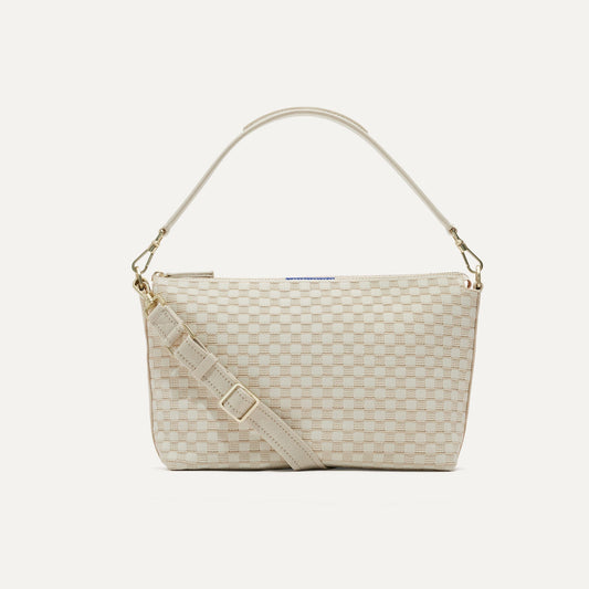 PLP |The Daily Crossbody Bag in White Sand shown from the front.