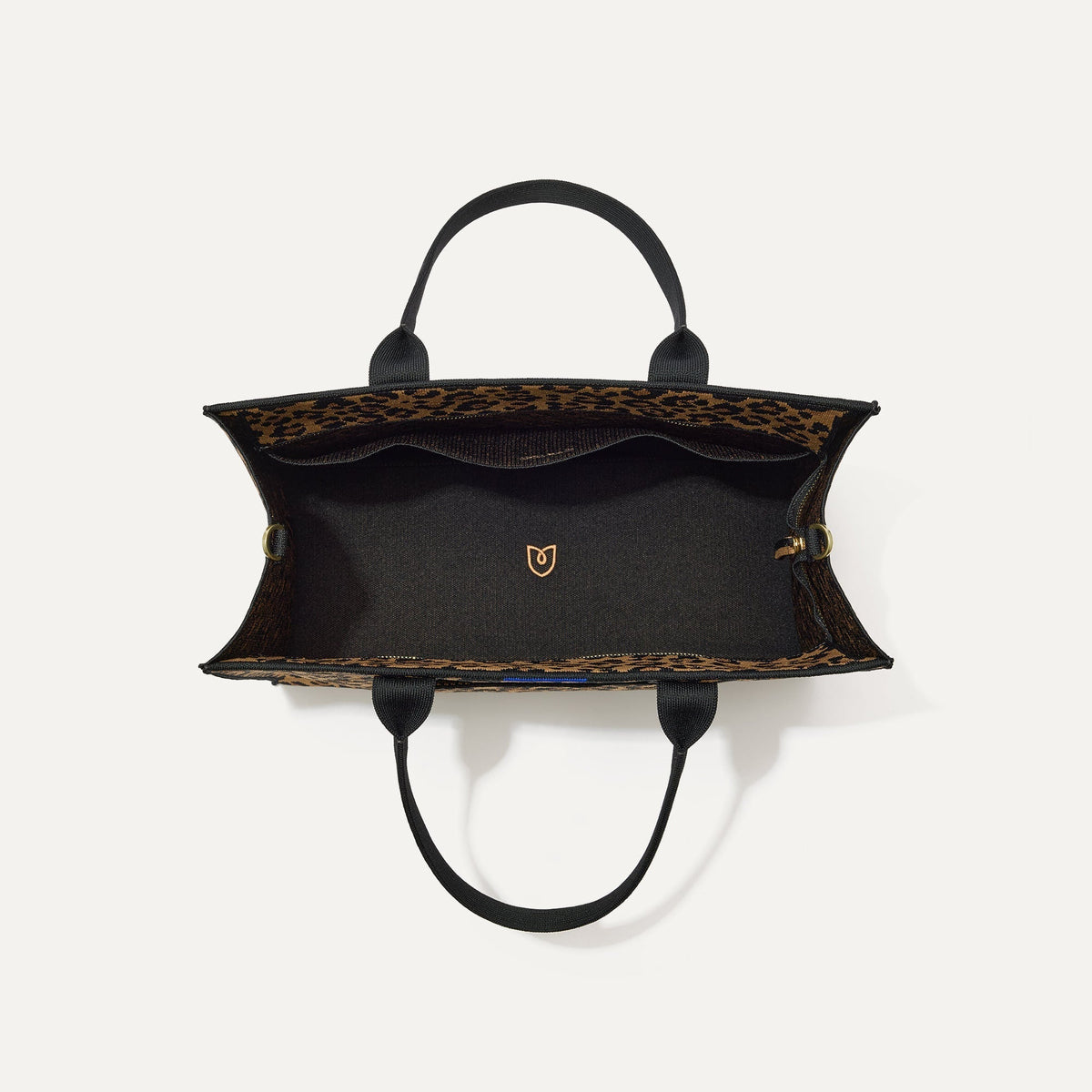 The Classic Tote in Toasty Cat, shown from above, with the interior exposed.