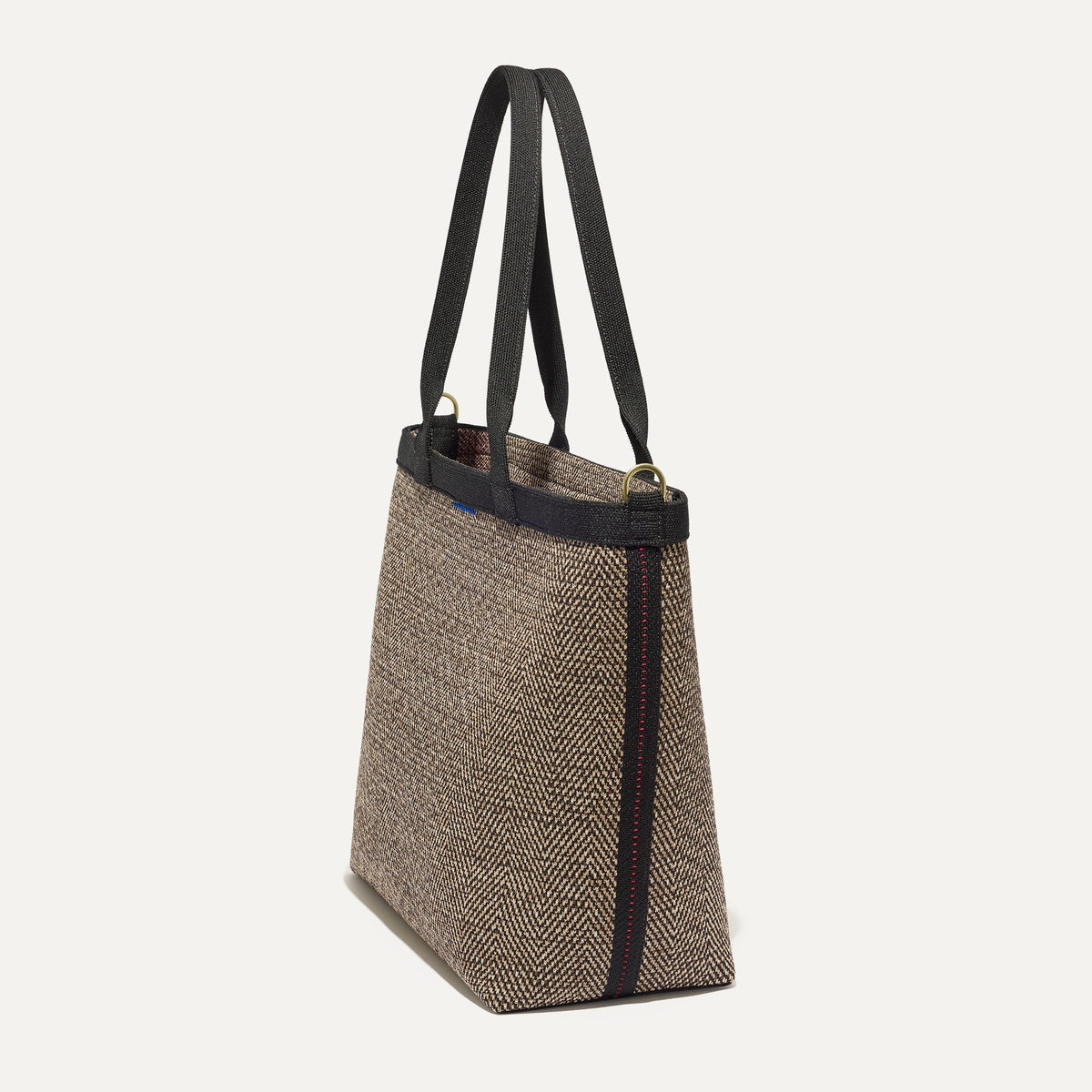 The Lightweight Zip Tote in Cacao Herringbone shown from the side.