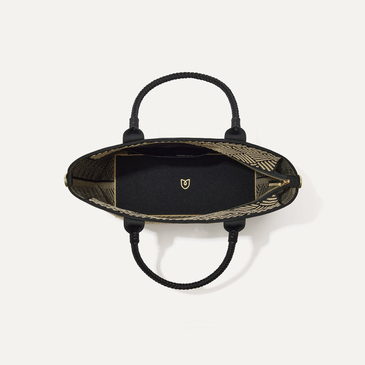 The Lightweight Zip Tote in Polar Zig Zag, shown from above with the interior exposed.