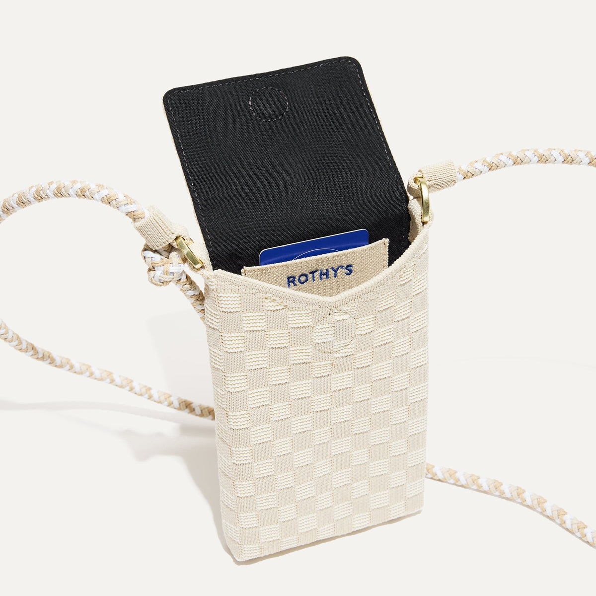 Close up of The Phone Crossbody interior slip pocket.