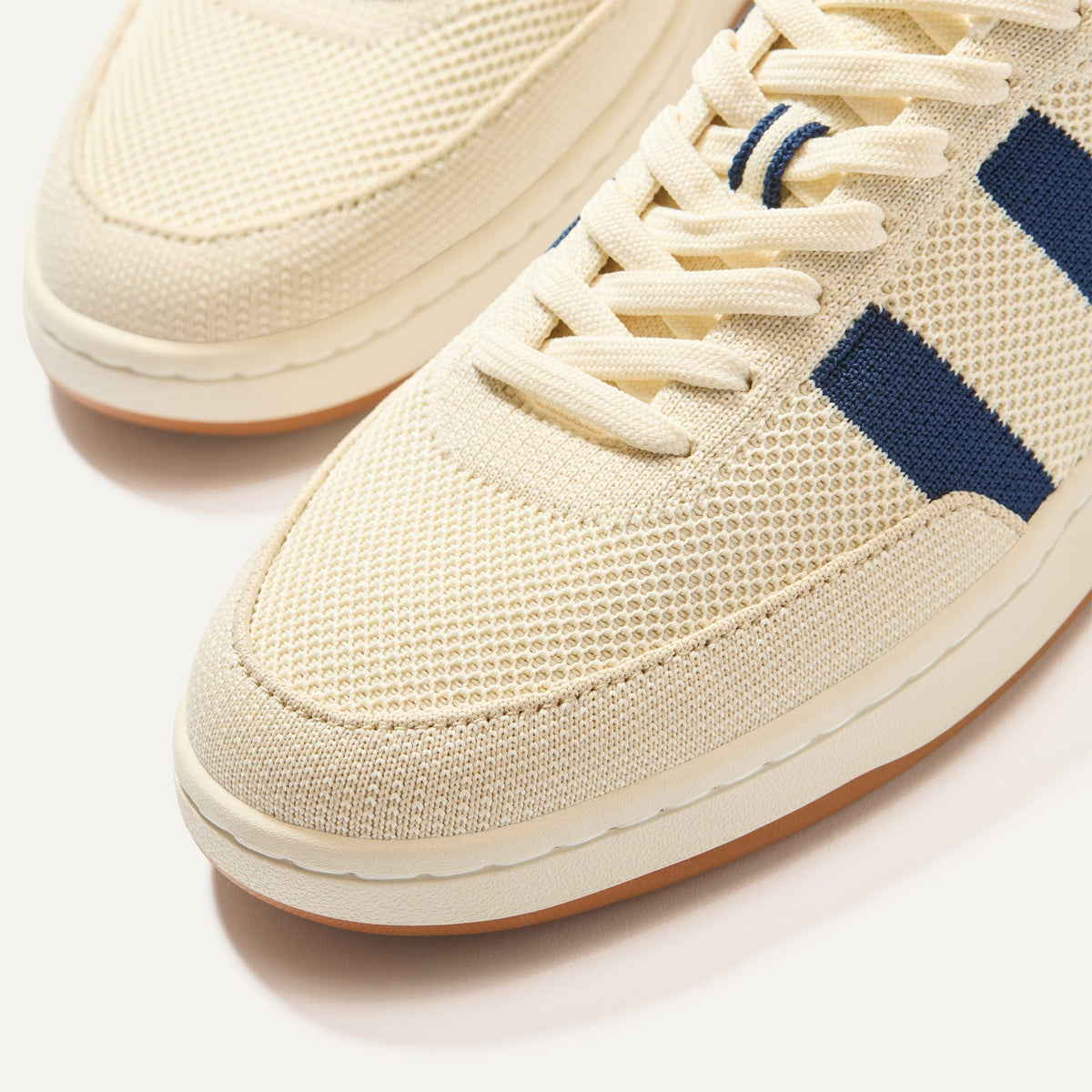 Close up of the toe and stitching details of The Men's Court Sneaker in Freestyle.