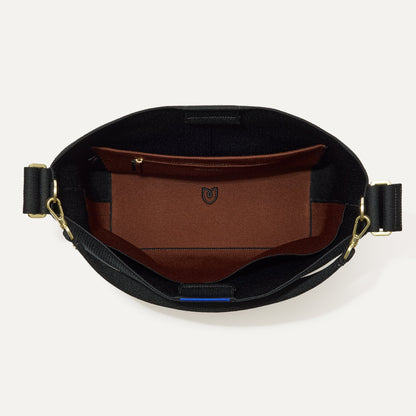 The Bucket Bag in ReVelvet™ Black shown from the top with base insert.