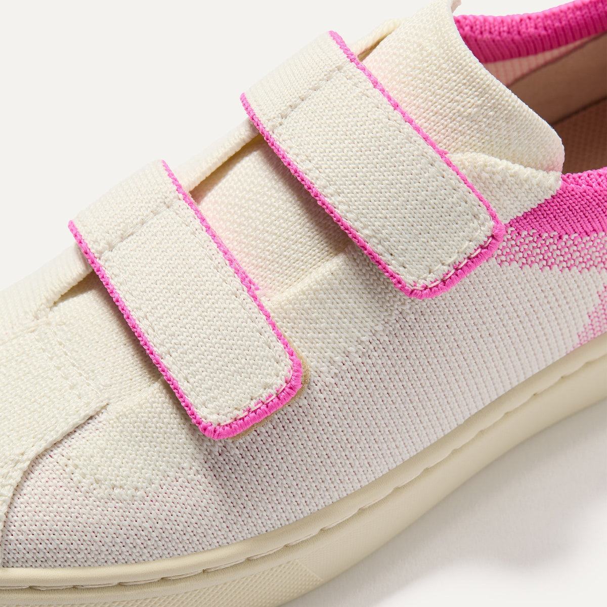 Close up of the vamp of The Kids Strap Sneaker in Pink Taffy.
