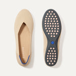 PLP |The Daily Flat in Ecru shown from the top with one shoe showing the outsole.