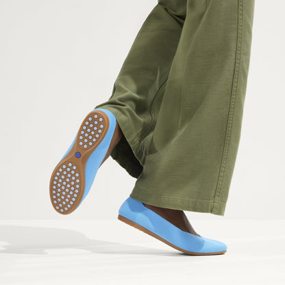 hover | Model wearing The Daily Flat in Robin Blue.