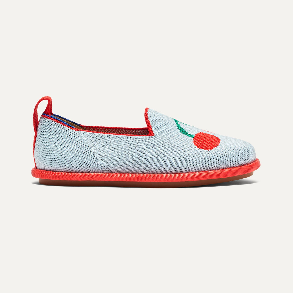 side | The Mini Loafer in Cherry Blue shown from a side view showing the outsole.