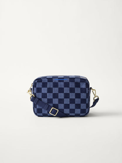 PLP | The Crossbody Camera Bag in ReVelvet™ Blue Ink, shown from the front.
